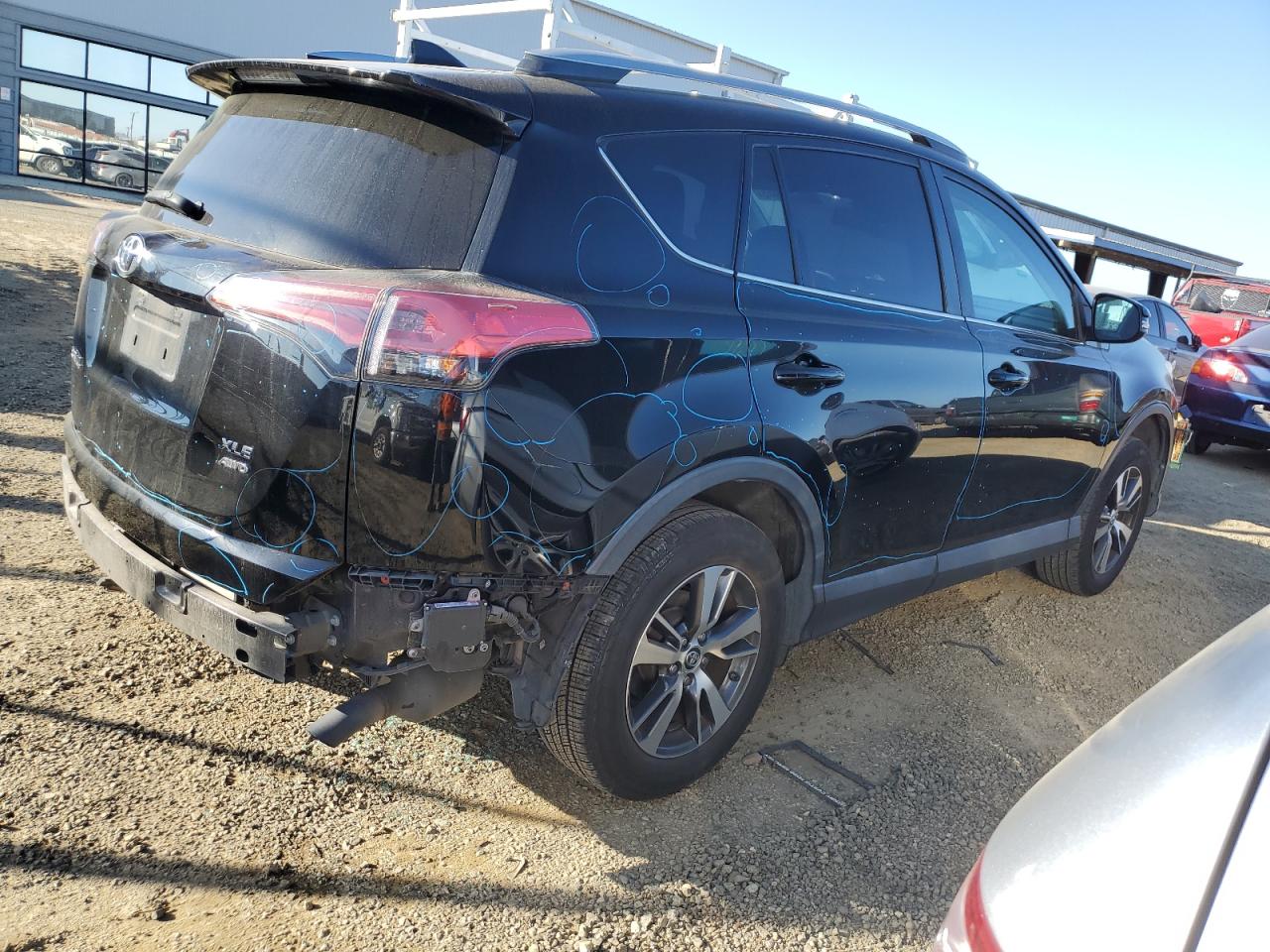 2018 Toyota RAV 4 VIN 2T3RFREVXJW732101 Copart auction photo, all over damage thumbnail 3