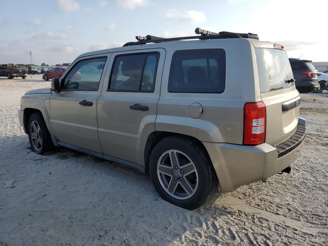 2010 Jeep Liberty (Patriot) VIN 1J4NT2GB4AD503020 Copart auction photo, minor dent/scratches damage thumbnail 2