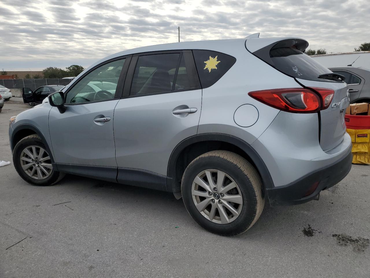 2016 Mazda CX-5 VIN JM3KE2CY6G0810337 Copart auction photo, rear end / minor dent/scratches damage thumbnail 2