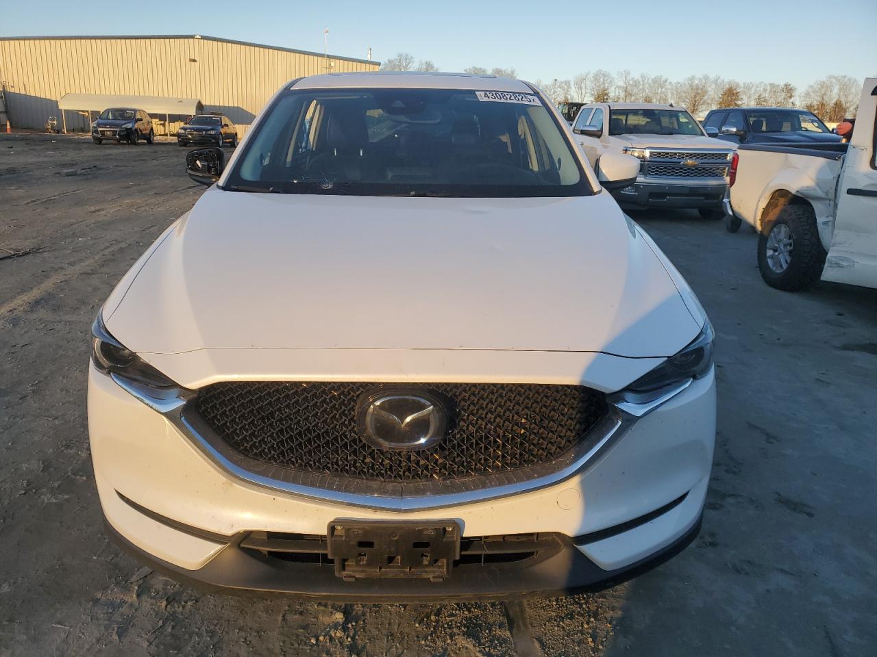 2019 Mazda CX-5 VIN JM3KFBDMXK1556031 Copart auction photo, rear end damage thumbnail 5