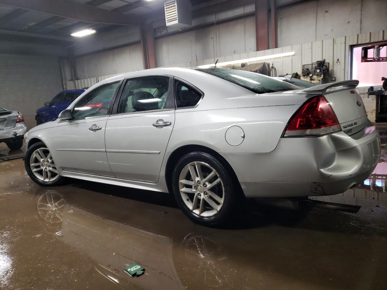 2012 Chevrolet Impala VIN 2G1WC5E35C1175735 Copart auction photo, front end / rear end damage thumbnail 2