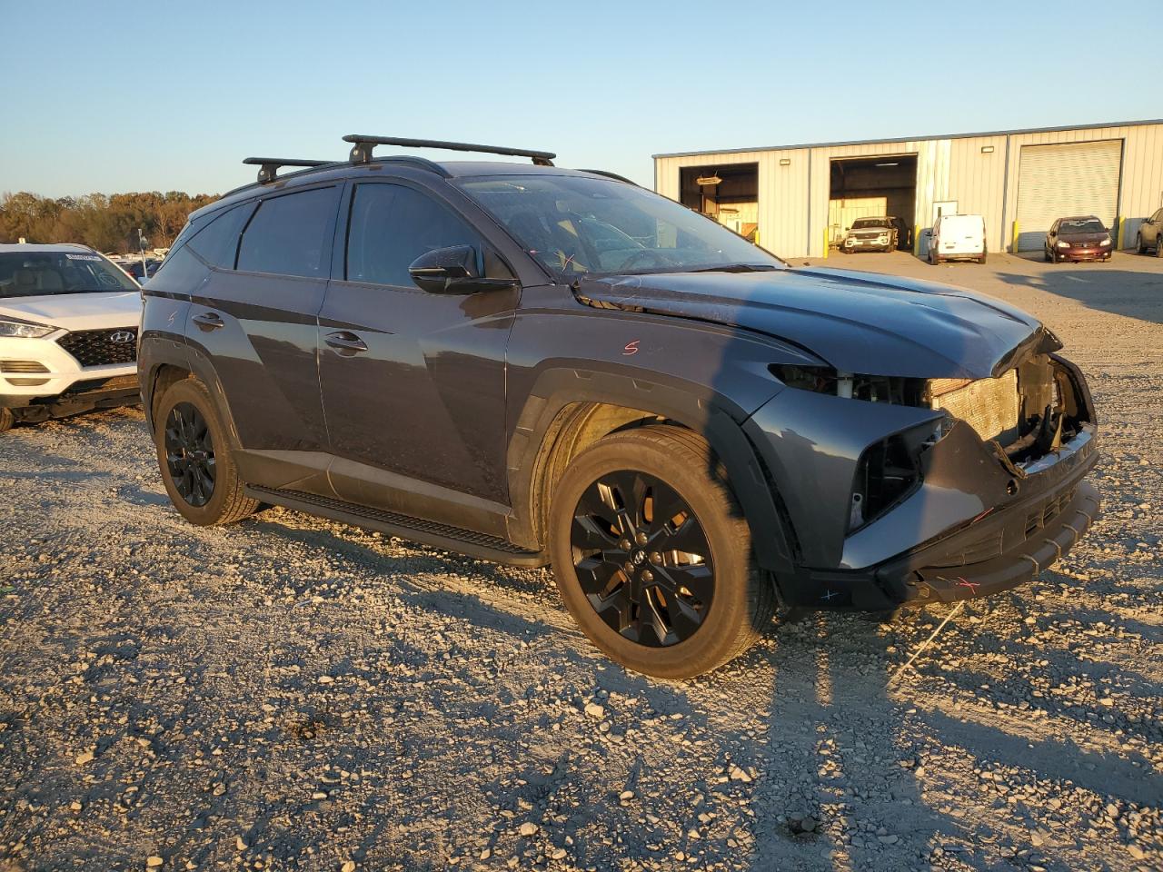 2023 Hyundai Tucson VIN KM8JFCAE1PU220924 Copart auction photo, front end / minor dent/scratches damage thumbnail 4