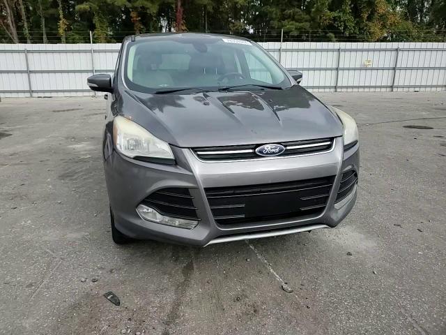 2013 Ford Escape VIN 1FMCU0HX5DUD71328 Copart auction photo, burn - engine damage thumbnail 11