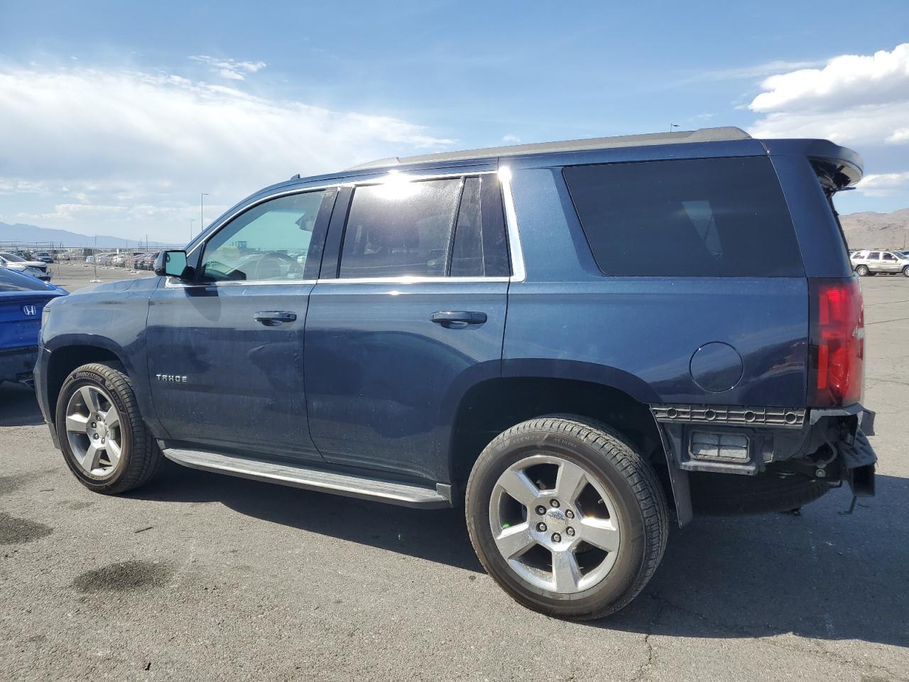 2019 Chevrolet Tahoe VIN 1GNSCAKC5KR149720 Copart auction photo, rear end damage thumbnail 2