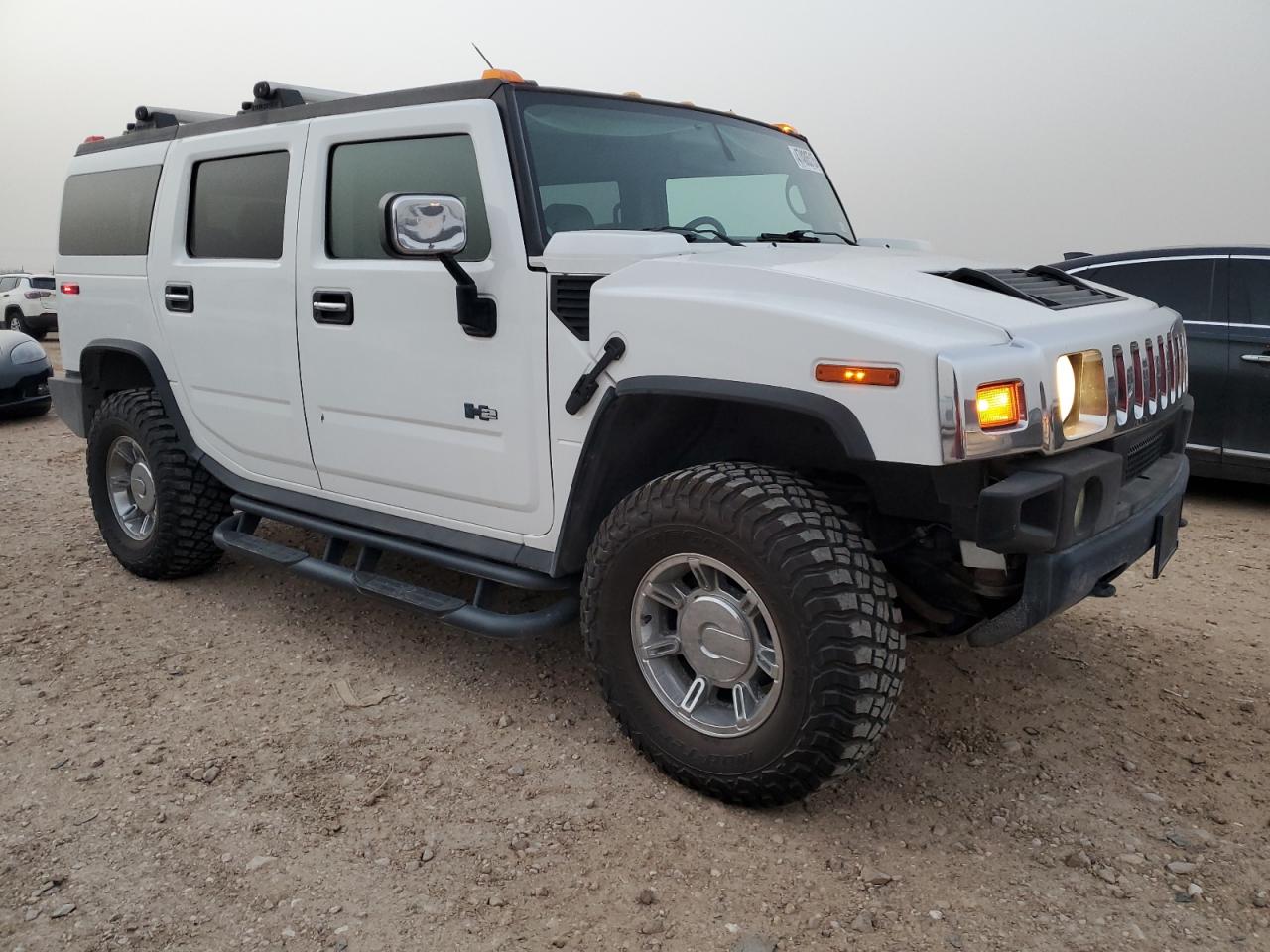 2003 Hummer H2 VIN 5GRGN23U03H146042 Copart auction photo, mechanical / minor dent/scratches damage thumbnail 4