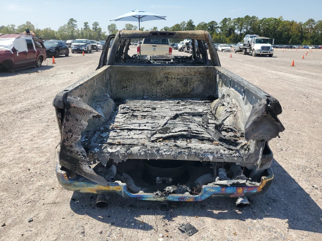 2021 RAM 1500 VIN 1C6SRFRM4MN589531 Copart auction photo, burn damage thumbnail 6