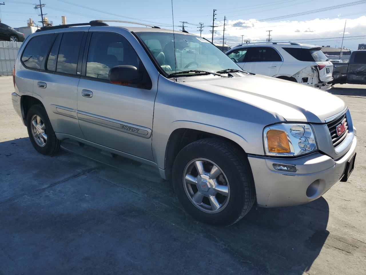 2004 GMC Envoy VIN 1GKDS13S042391387 Copart auction photo, side damage thumbnail 4