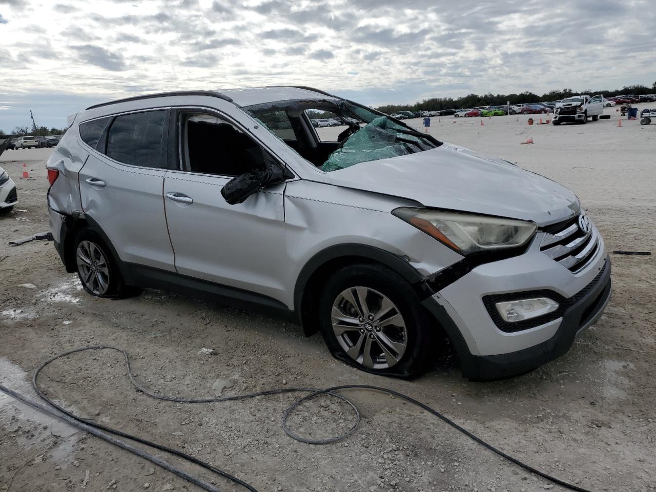 2013 Hyundai Santa Fe VIN 5XYZU3LB7DG034530 Copart auction photo, rollover damage thumbnail 4