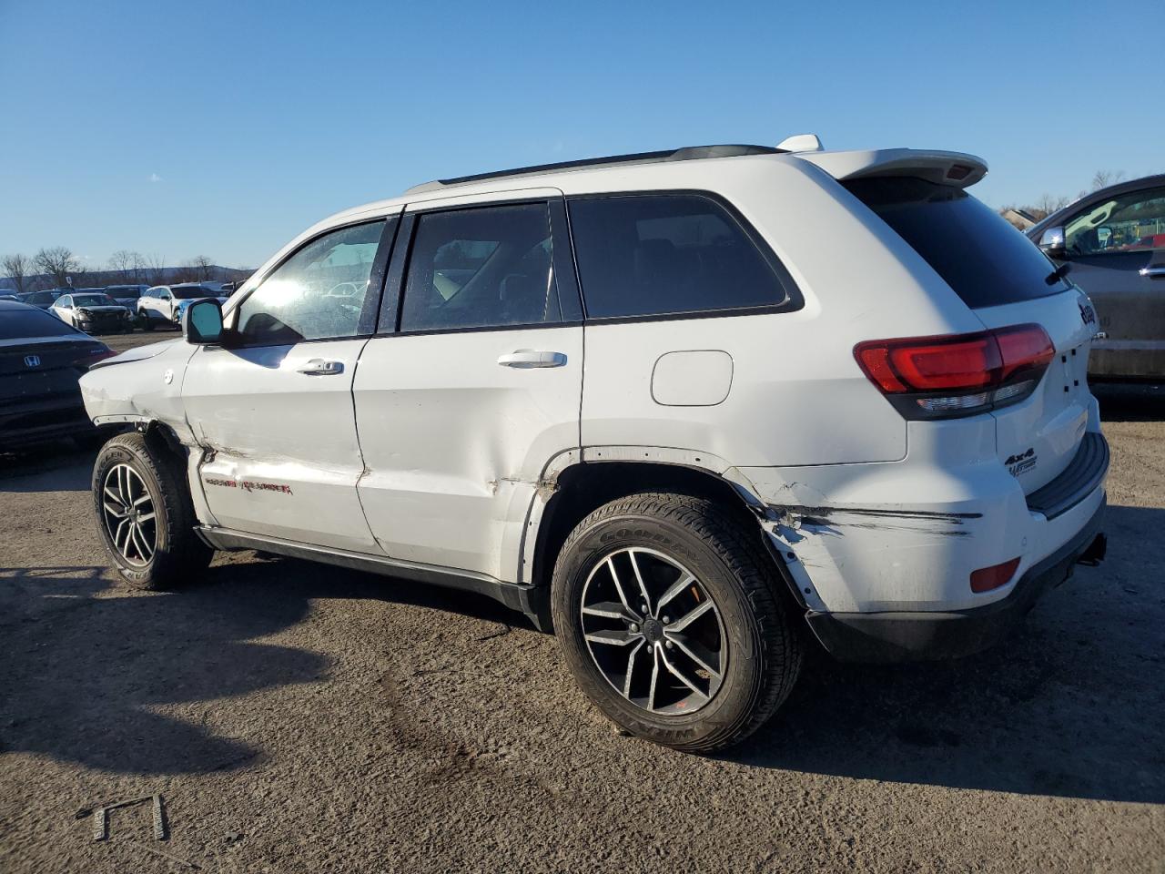 2020 Jeep Grand Cherokee VIN 1C4RJFLG0LC135563 Copart auction photo, side / front end damage thumbnail 2
