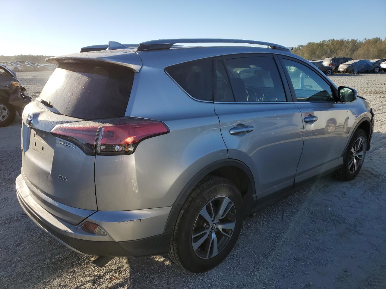 2017 Toyota RAV 4 VIN 2T3WFREV8HW397305 Copart auction photo, undercarriage / front end damage thumbnail 3