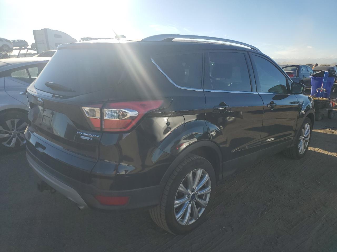 2017 Ford Escape VIN 1FMCU9J91HUC50138 Copart auction photo, side / hail damage thumbnail 3