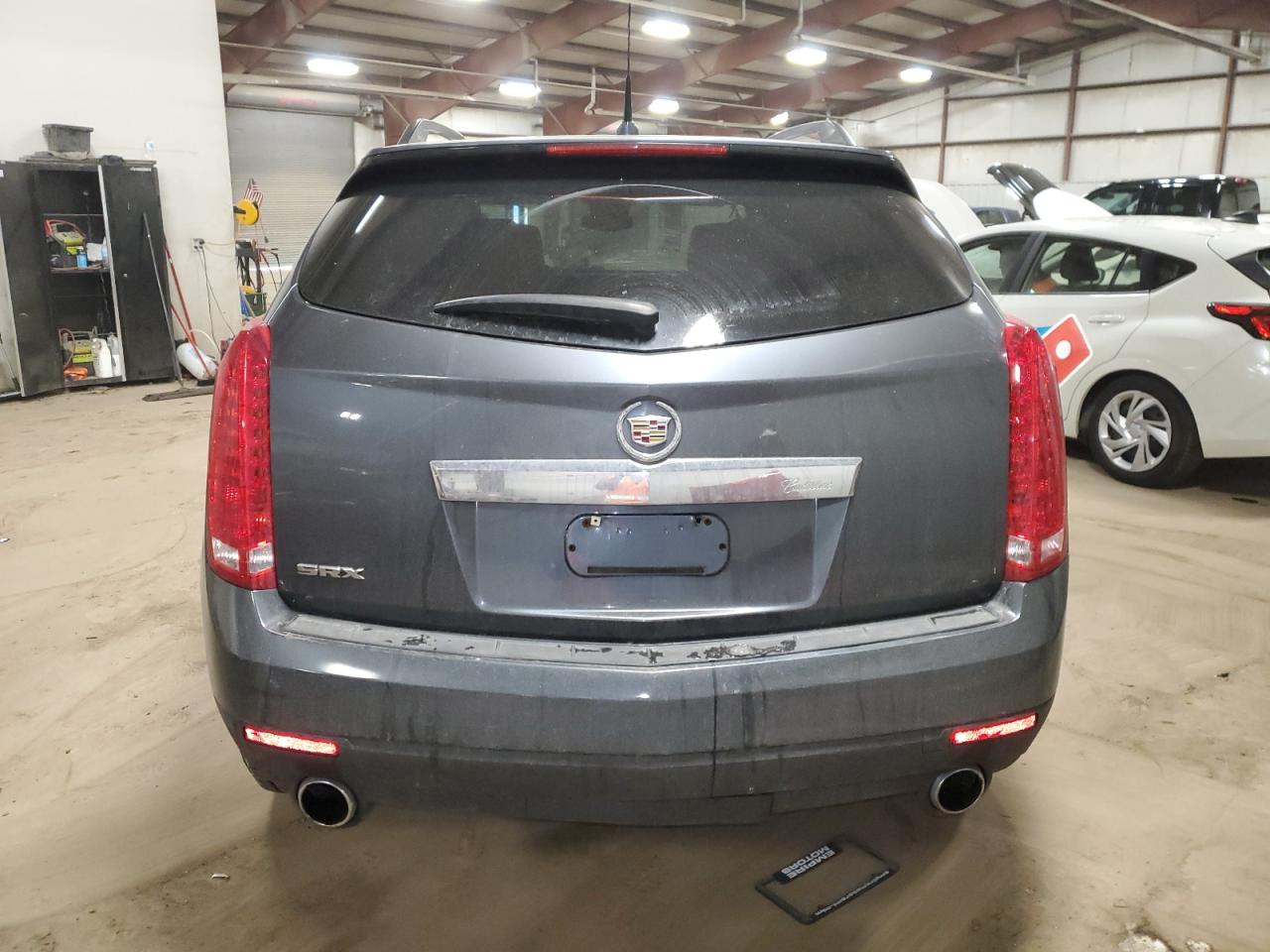 2010 Cadillac SRX VIN 3GYFNGEY9AS512234 Copart auction photo, side / front end damage thumbnail 6