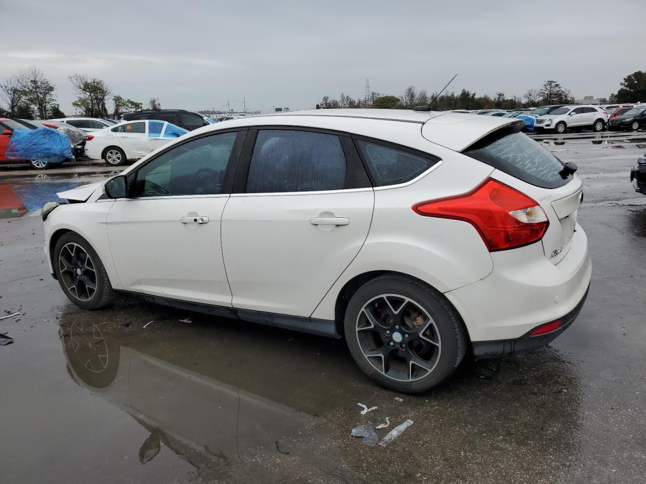 2012 Ford Focus VIN 1FAHP3N25CL219975 Copart auction photo, front end damage thumbnail 2
