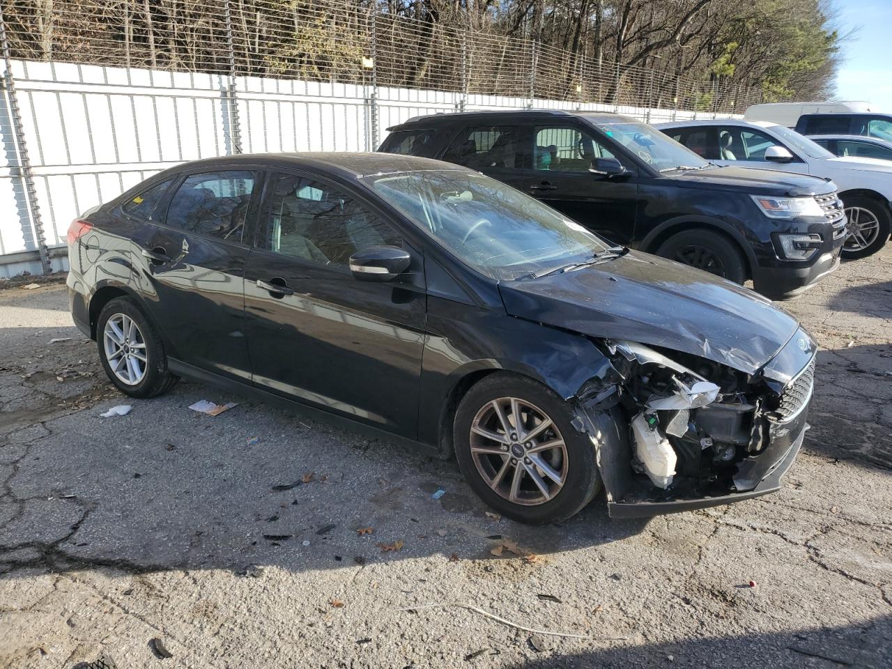 2016 Ford Focus VIN 1FADP3F22GL385115 Copart auction photo, front end / side damage thumbnail 4