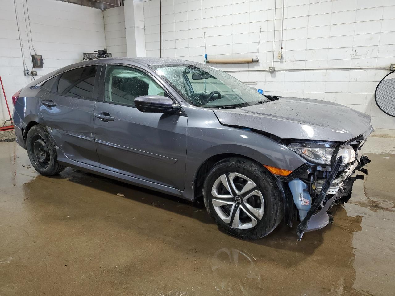 2017 Honda Civic VIN 19XFC2F54HE065078 Copart auction photo, all over damage thumbnail 4