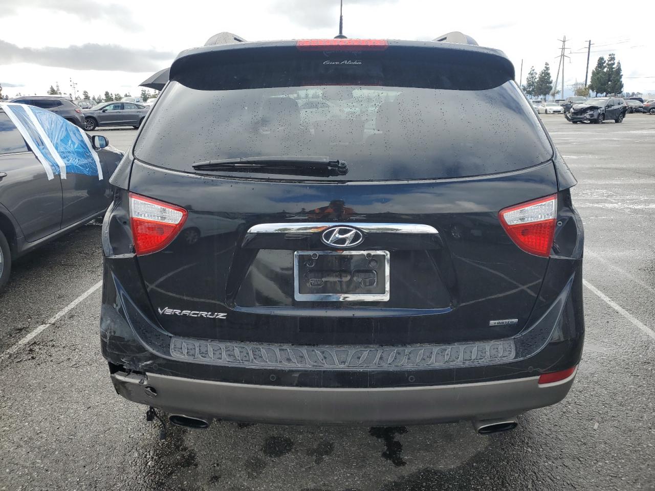 2012 Hyundai Veracruz VIN KM8NU4CC2CU191002 Copart auction photo, front end / rear end damage thumbnail 6