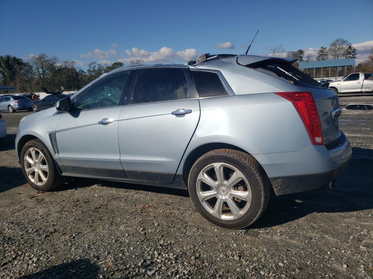 2013 Cadillac SRX VIN 3GYFNHE38DS654315 Copart auction photo, top/roof damage thumbnail 2