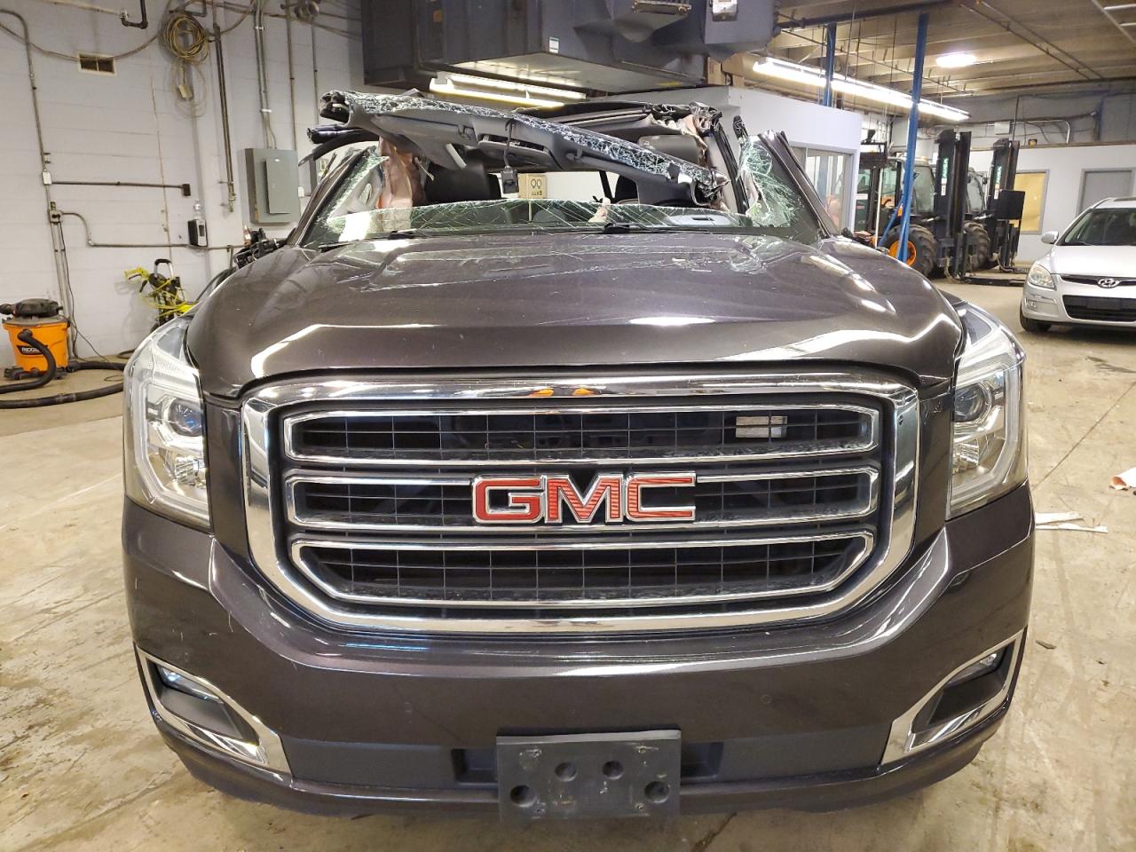 2015 GMC Yukon VIN 1GKS2BKC4FR133391 Copart auction photo, rollover damage thumbnail 5