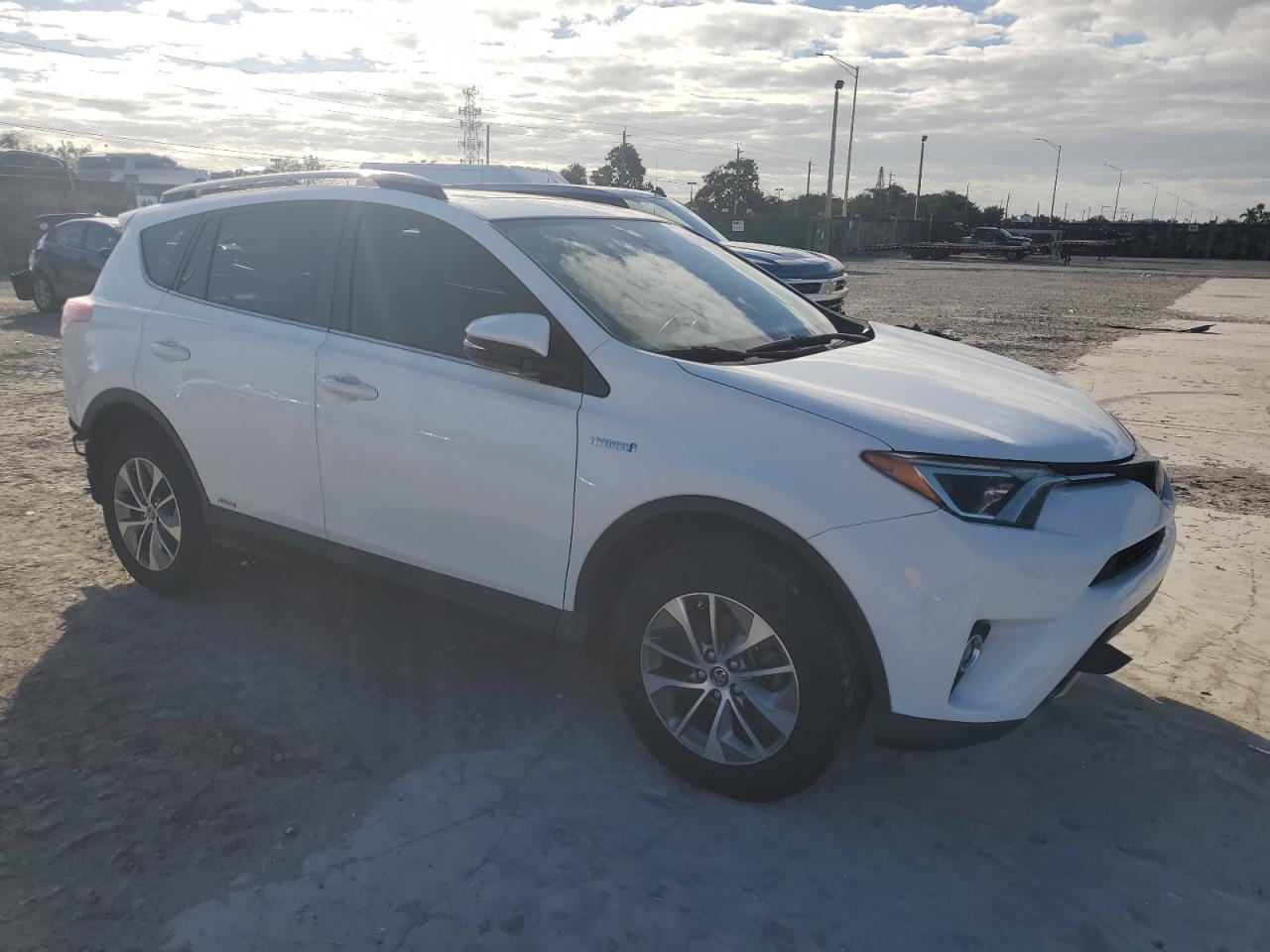 2018 Toyota RAV 4 VIN JTMRJREV5JD216093 Copart auction photo, rear end damage thumbnail 4