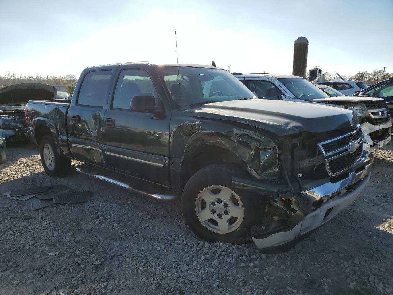 2006 Chevrolet Silverado VIN 2GCEK13T061225625 Copart auction photo, all over damage thumbnail 4