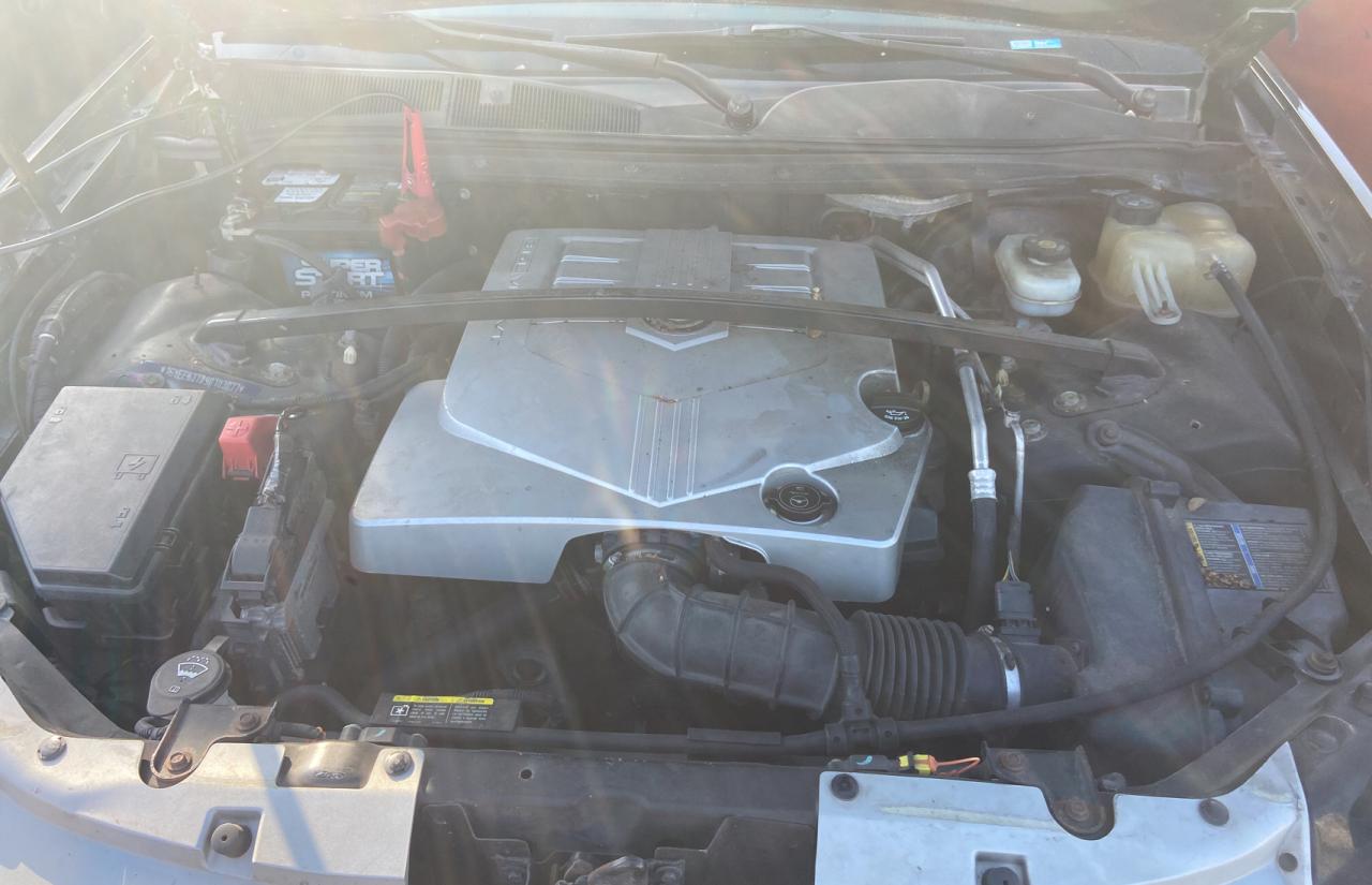 2009 Cadillac SRX VIN 1GYEE637890103077 Copart auction photo, minor dent/scratches / partial repair damage thumbnail 7