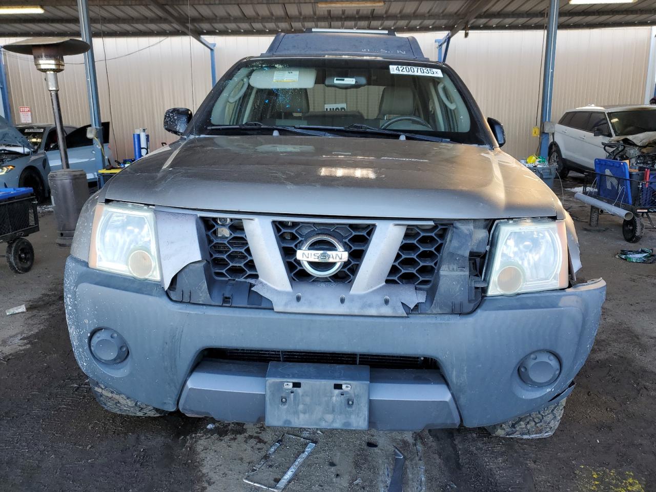 2005 Nissan XTerra VIN 5N1AN08W05C611341 Copart auction photo, front end / side damage thumbnail 5