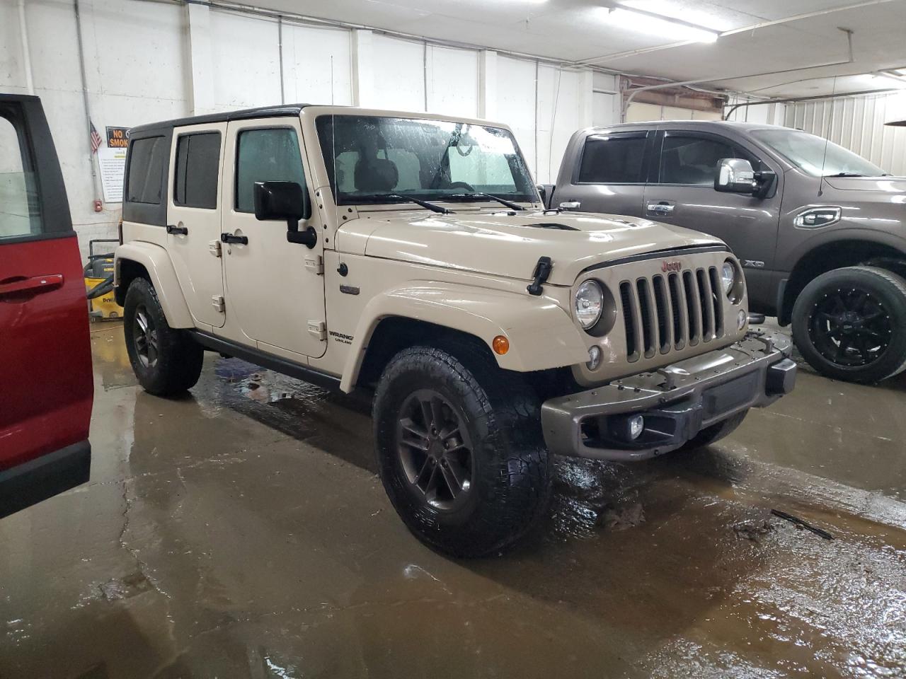 2016 Jeep Wrangler VIN 1C4BJWEG7GL214149 Copart auction photo, side / front end damage thumbnail 4