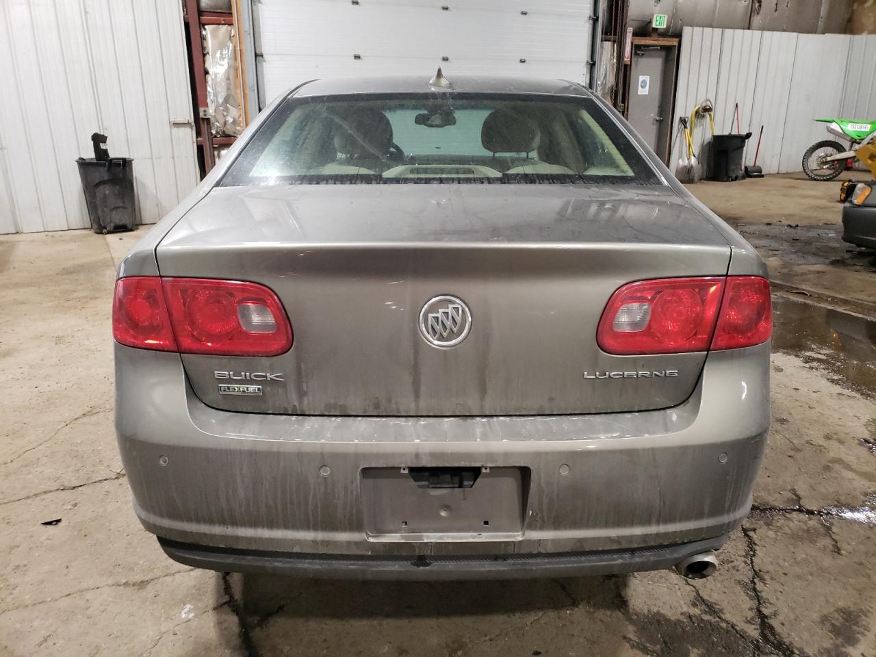 2010 Buick Lucerne VIN 1G4HB5EM7AU104674 Copart auction photo, side / all over damage thumbnail 6