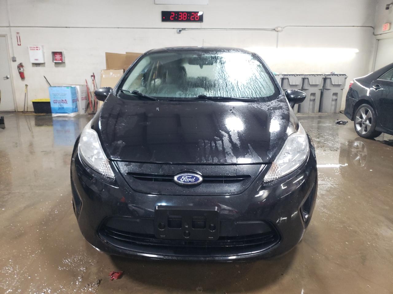 2013 Ford Fiesta VIN 3FADP4TJXDM214012 Copart auction photo, side / minor dent/scratches damage thumbnail 5
