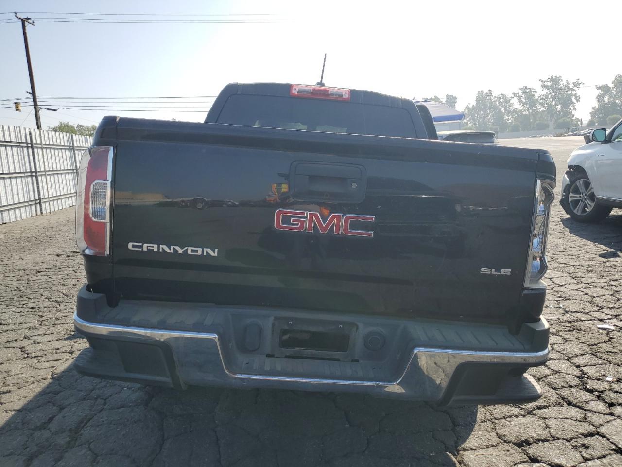 2018 GMC Canyon VIN 1GTG5CEA1J1328428 Copart auction photo, side / front end damage thumbnail 6