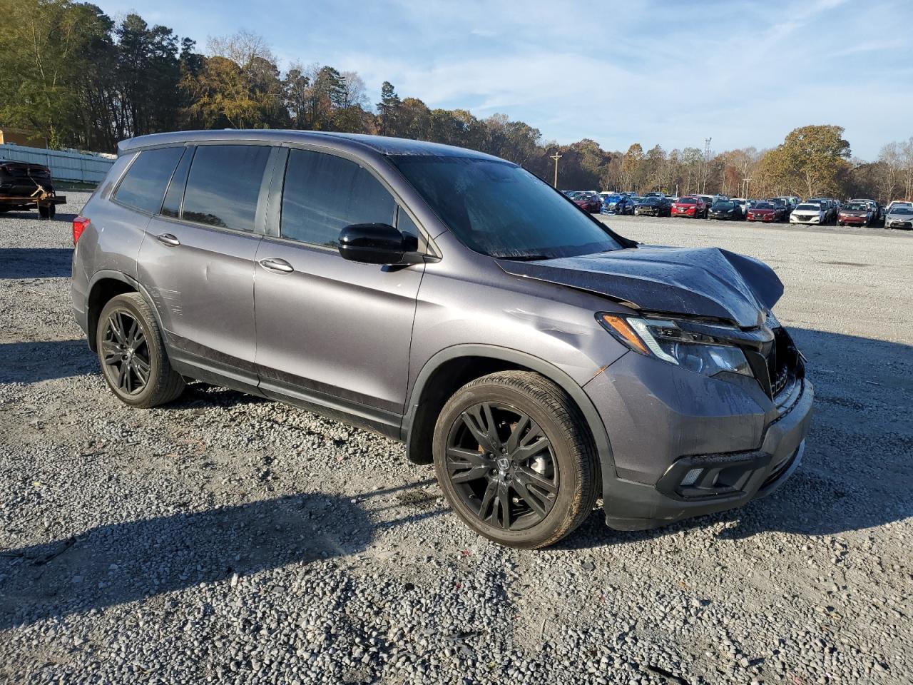 2021 Honda Passport VIN 5FNYF7H20MB014682 Copart auction photo, front end / minor dent/scratches damage thumbnail 4