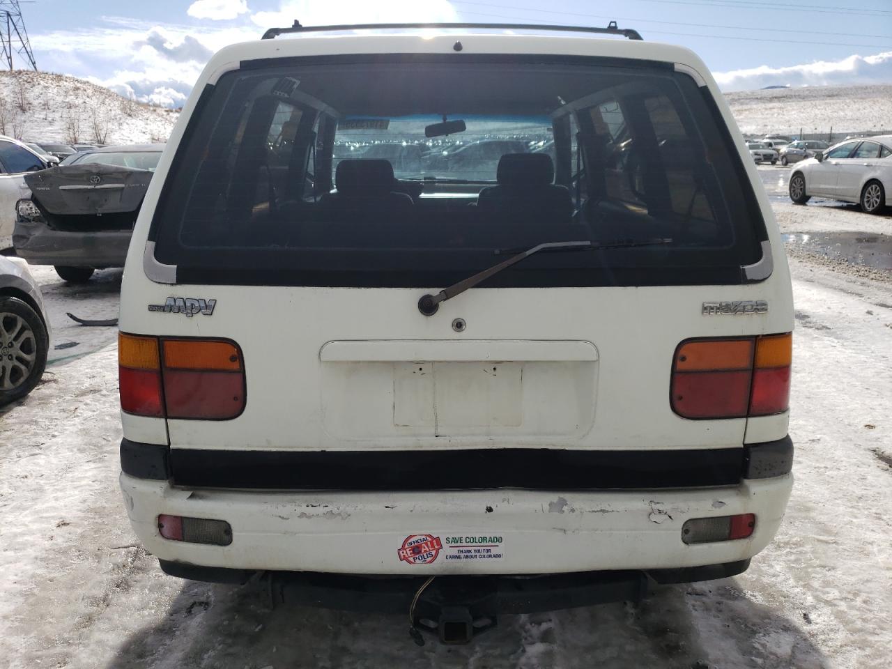 1990 Mazda MPV VIN JM3LV522XL0249461 Copart auction photo, rear end / hail damage thumbnail 6
