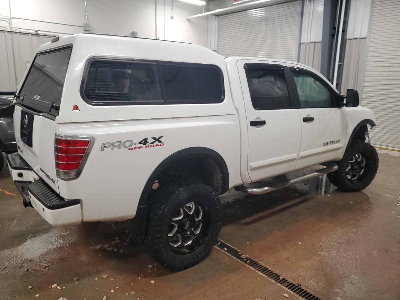2010 Nissan Titan VIN 1N6BA0EC2AN308717 Copart auction photo, front end damage thumbnail 3