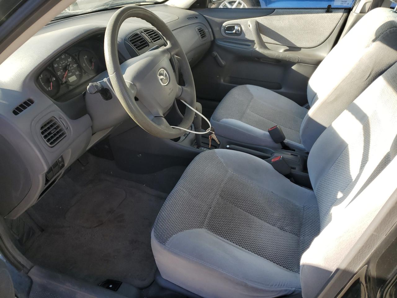 2000 Mazda Protege VIN JM1BJ2220Y0239835 Copart auction photo, front end / all over damage thumbnail 7