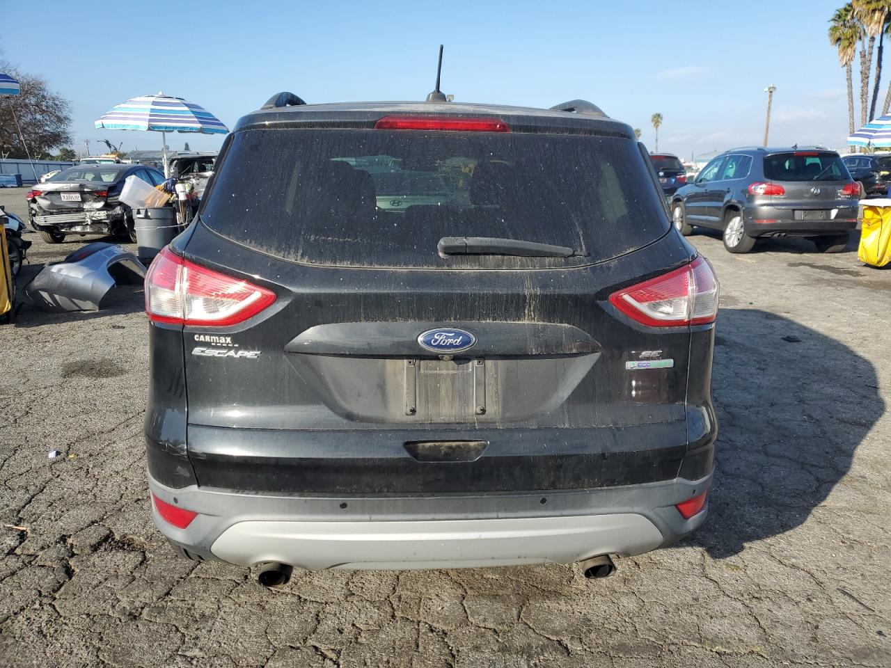 2015 Ford Escape VIN 1FMCU0GX4FUA18843 Copart auction photo, side / minor dent/scratches damage thumbnail 6