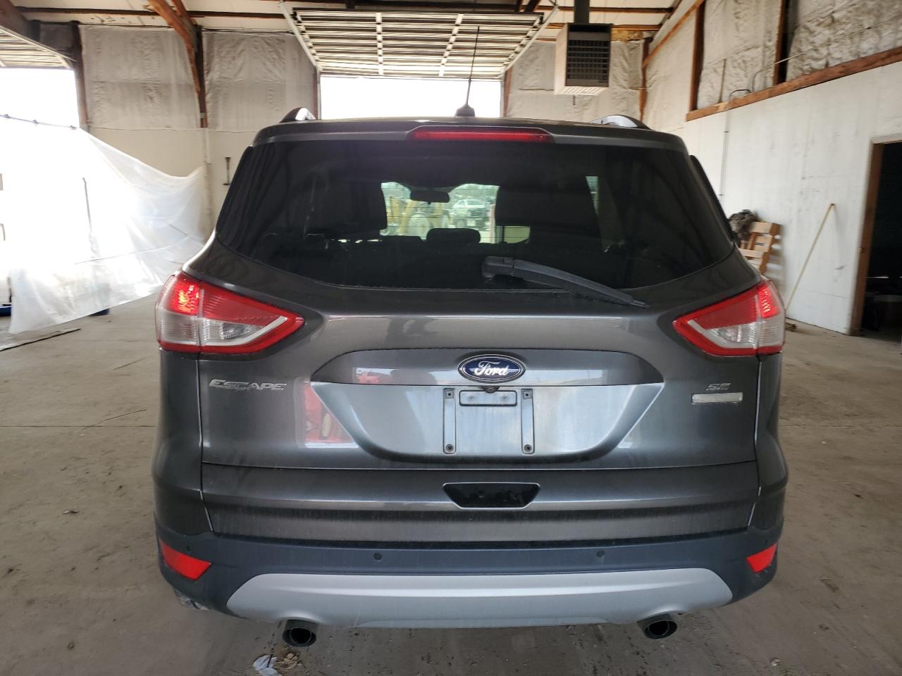 2016 Ford Escape VIN 1FMCU0GX4GUB81302 Copart auction photo, front end damage thumbnail 6
