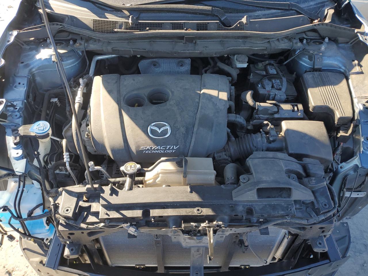2015 Mazda CX-5 VIN JM3KE4DY6F0490333 Copart auction photo, front end / minor dent/scratches damage thumbnail 12