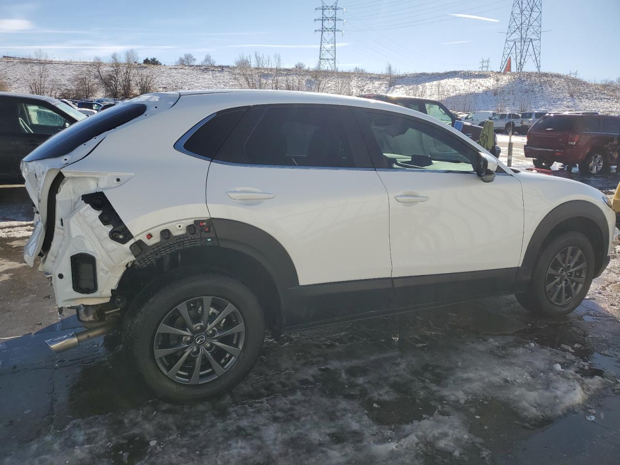 2023 Mazda CX-30 VIN 3MVDMBAM8PM562155 Copart auction photo, rear end damage thumbnail 3