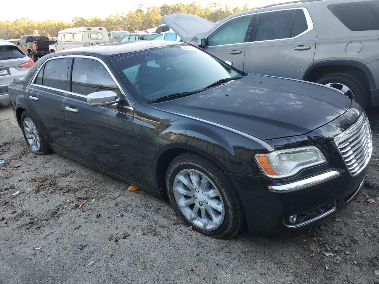 2012 Chrysler 300 VIN 2C3CCAET1CH147400 Copart auction photo, vandalism damage thumbnail 4
