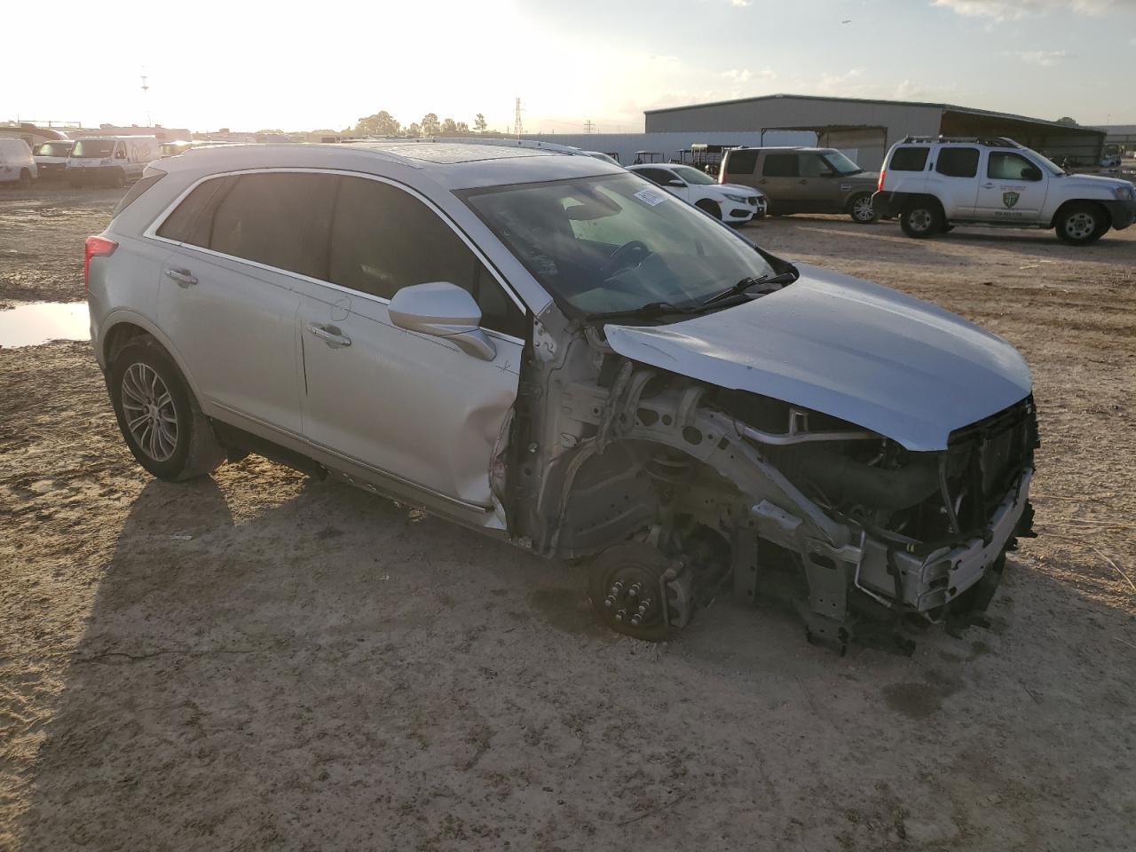 2017 Cadillac XT5 VIN 1GYKNBRSXHZ110694 Copart auction photo, all over damage thumbnail 4