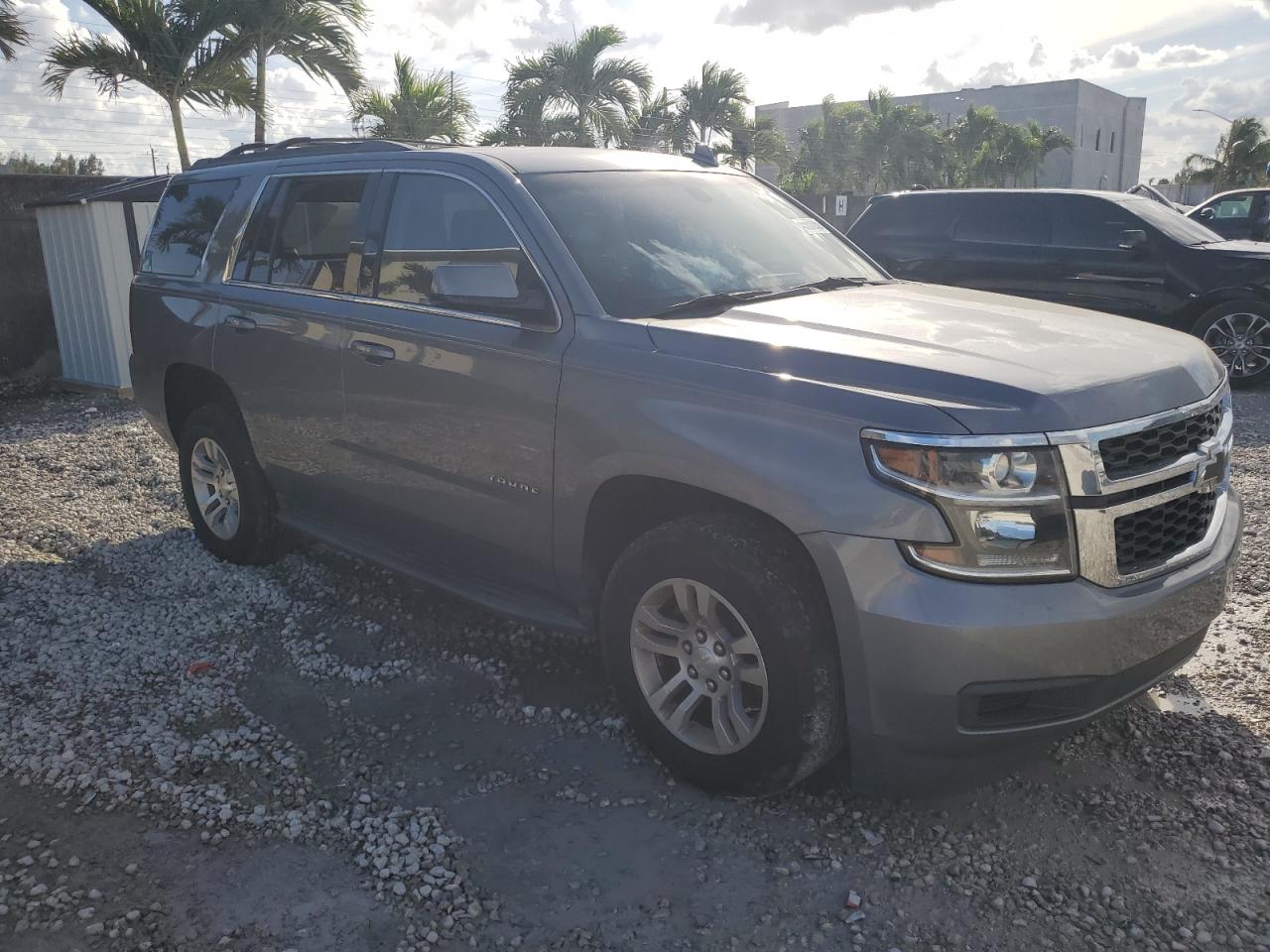 2020 Chevrolet Tahoe VIN 1GNSCAKC4LR120582 Copart auction photo, burn damage thumbnail 4