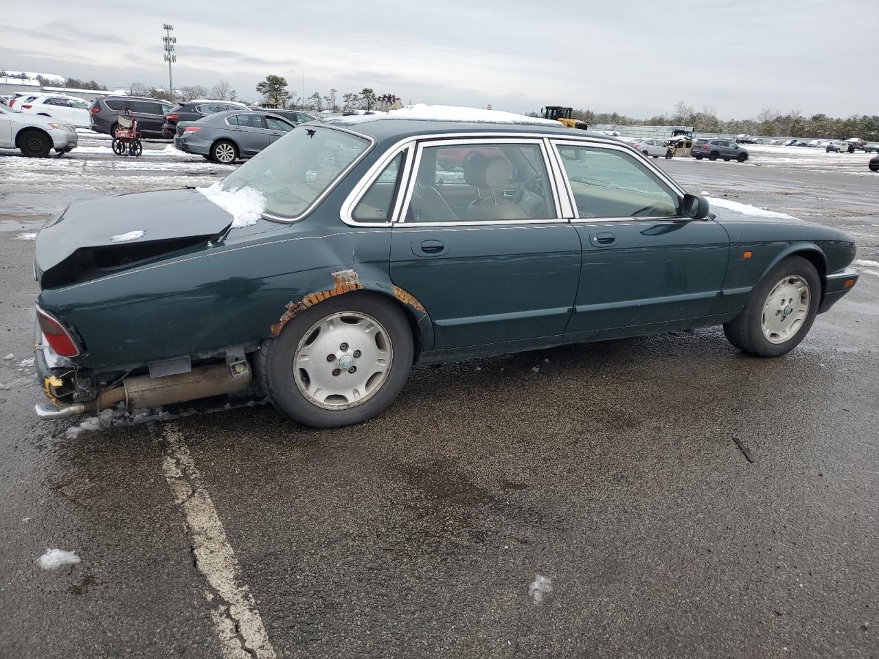 1995 Jaguar XJ VIN SAJHX1746SC730186 Copart auction photo, rear end / undercarriage damage thumbnail 3
