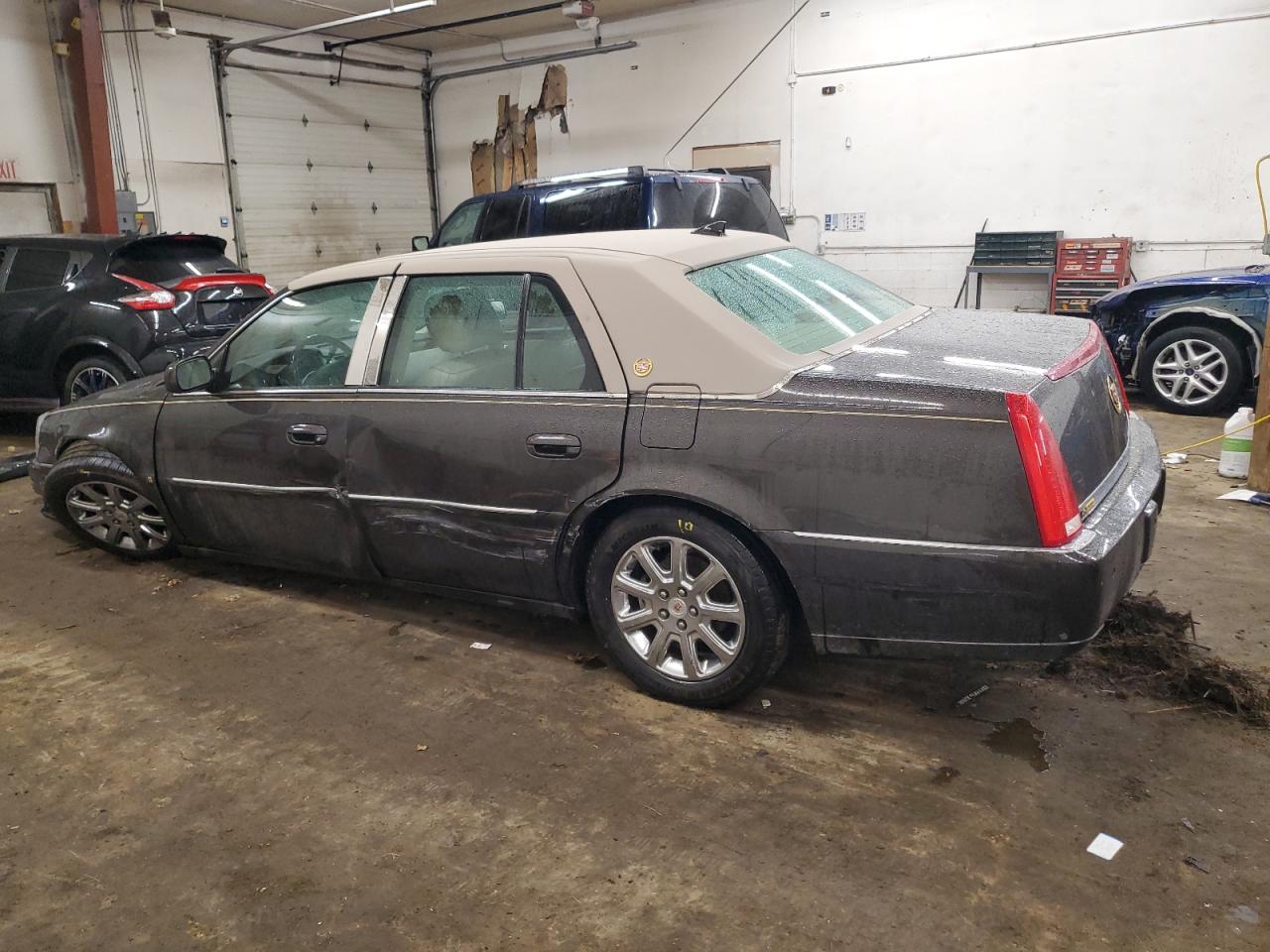 2009 Cadillac DTS VIN 1G6KD57Y29U108151 Copart auction photo, all over damage thumbnail 2