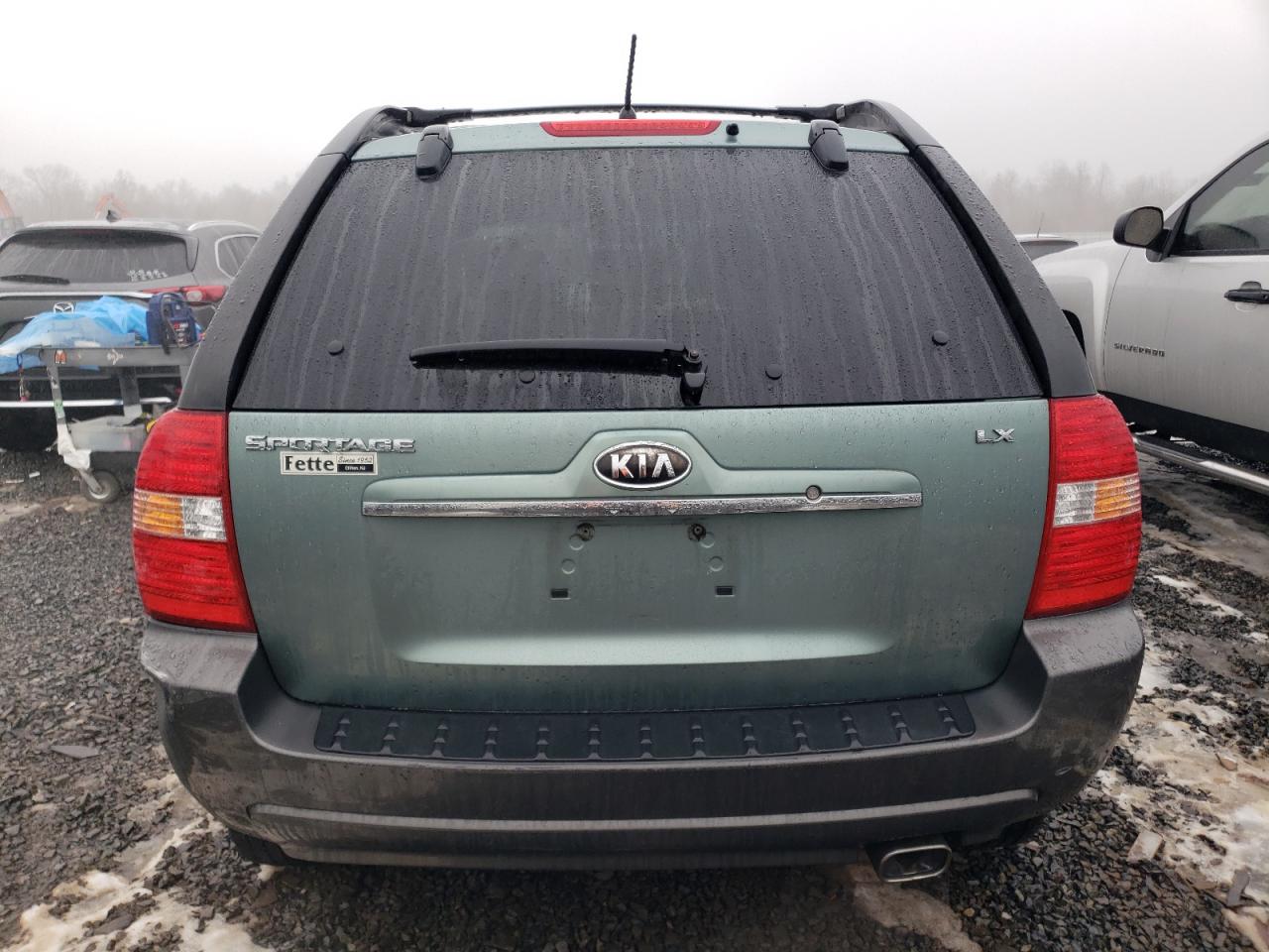 2007 KIA Sportage VIN KNDJF724677323417 Copart auction photo, front end / side damage thumbnail 6