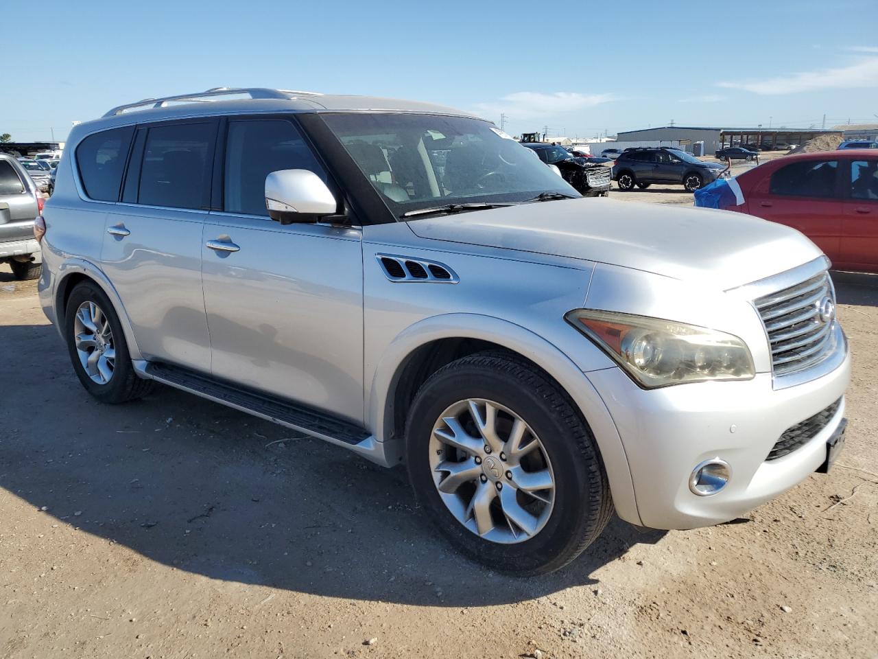 2011 Infiniti QX56 VIN JN8AZ2NFXB9503606 Copart auction photo, minor dent/scratches / normal wear damage thumbnail 4