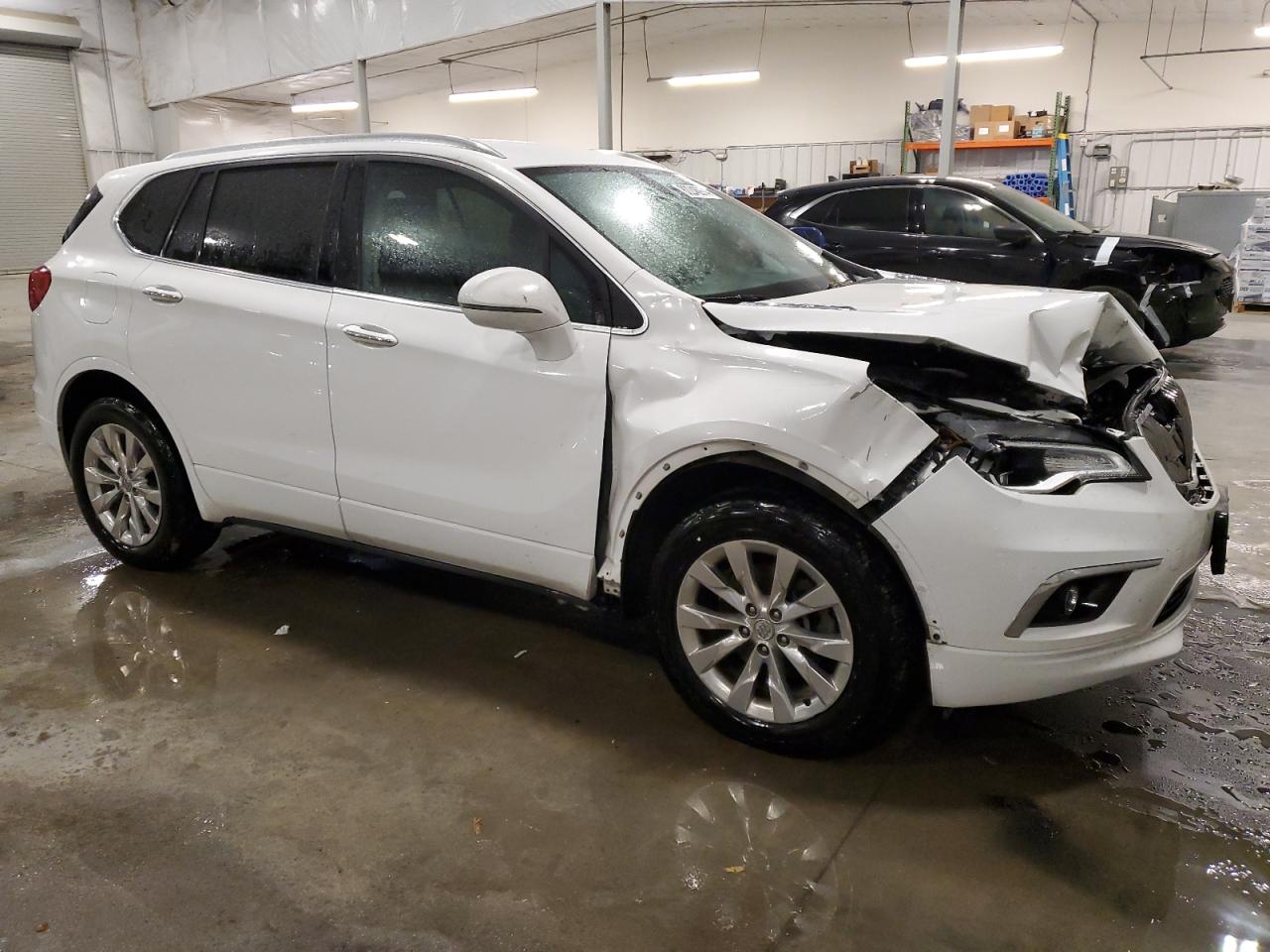 2017 Buick Envision VIN LRBFXDSA2HD198022 Copart auction photo, front end / side damage thumbnail 4