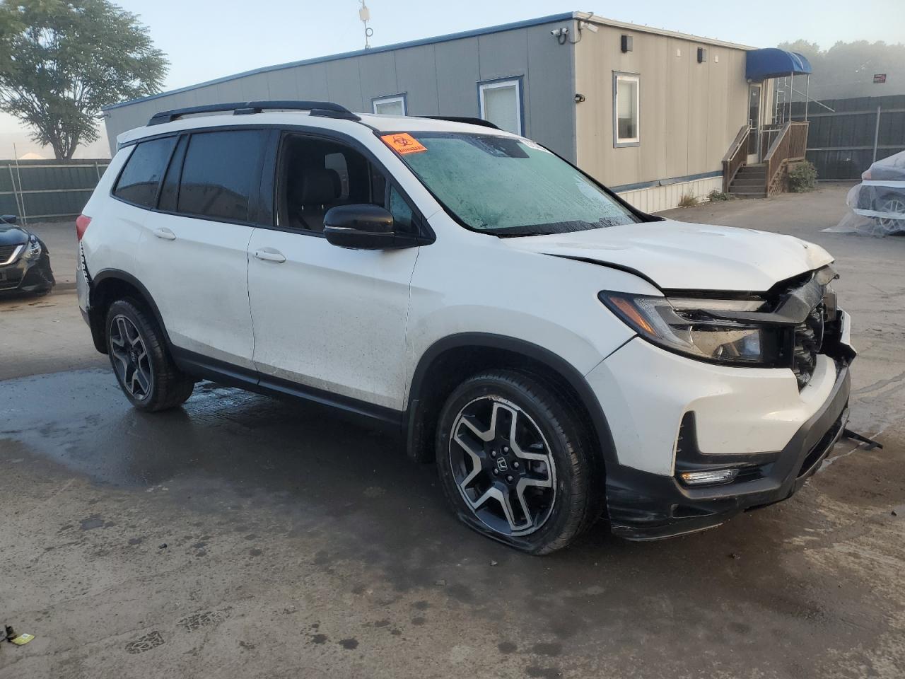2022 Honda Passport VIN 5FNYF8H00NB009729 Copart auction photo, front end / rear end damage thumbnail 4