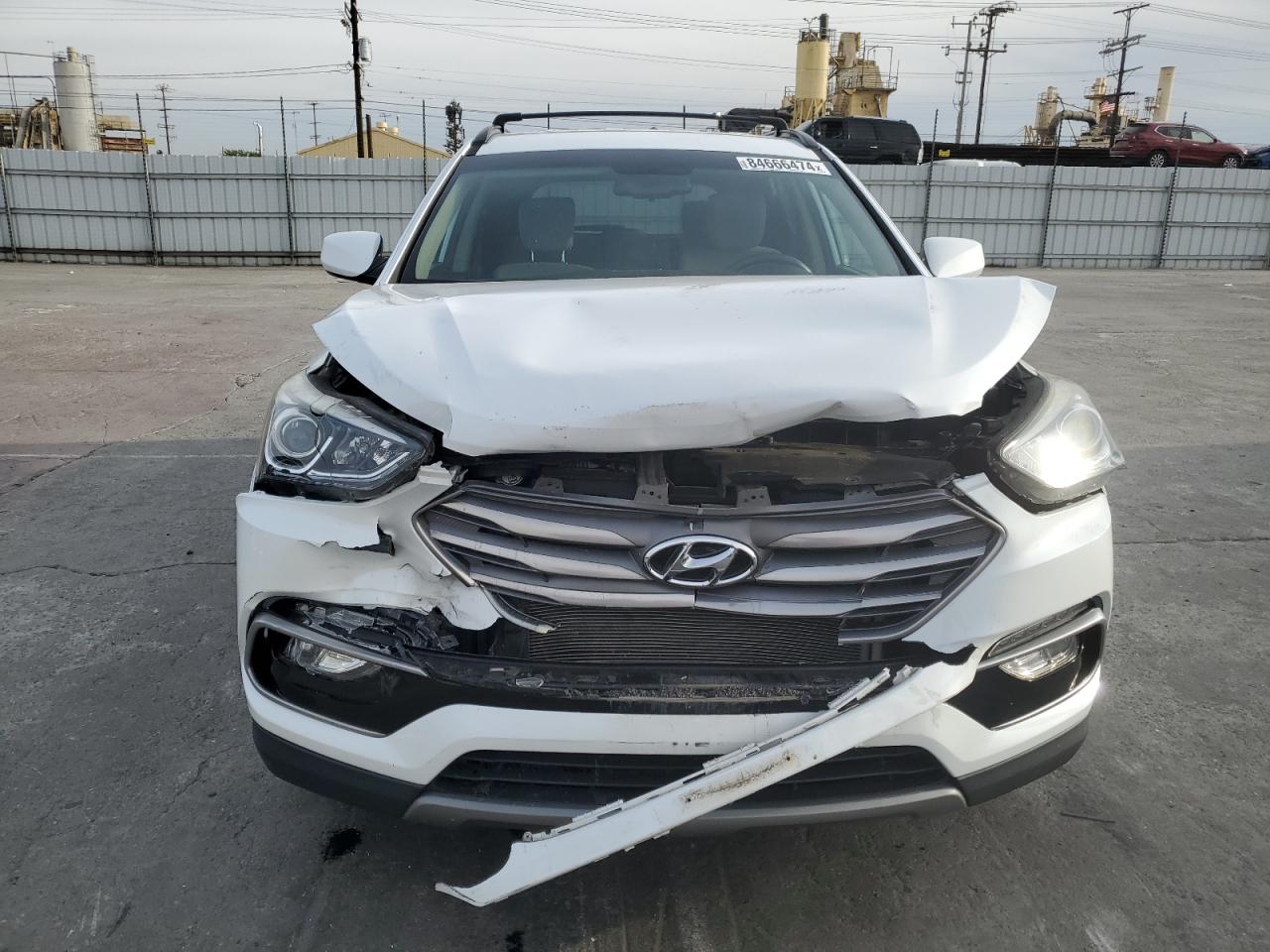 2017 Hyundai Santa Fe VIN 5NMZU3LB9HH015859 Copart auction photo, front end damage thumbnail 5