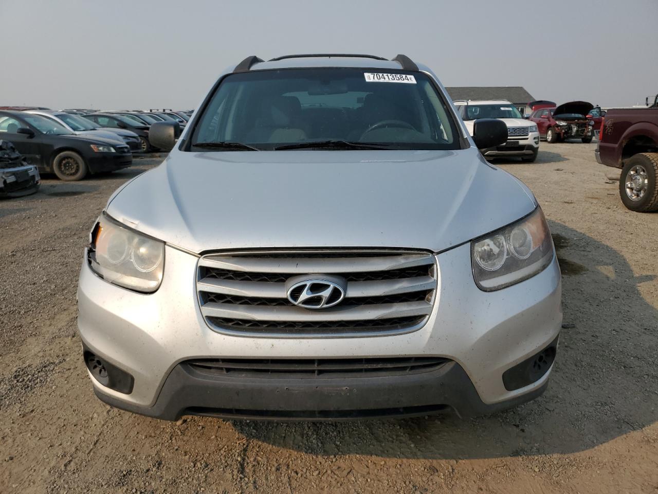 2012 Hyundai Santa Fe VIN 5XYZGDAB5CG113094 Copart auction photo, front end / side damage thumbnail 5