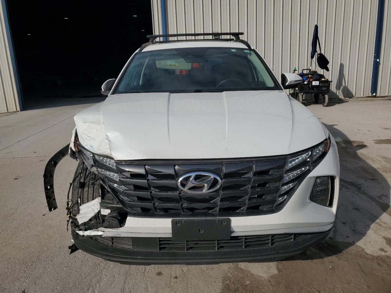 2022 Hyundai Tucson VIN 5NMJFCAE4NH091053 Copart auction photo, rear end / front end damage thumbnail 5